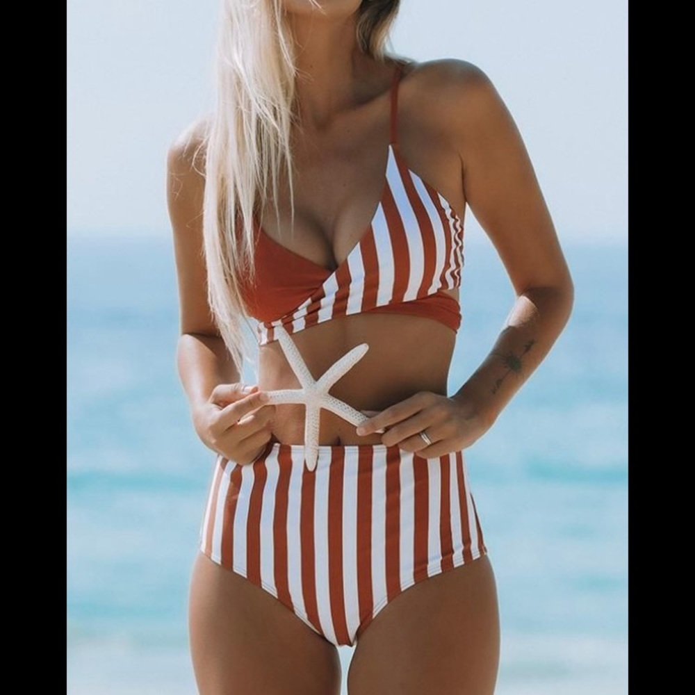 Rust and white striped, high waisted Beachsissi bikini. Size small.